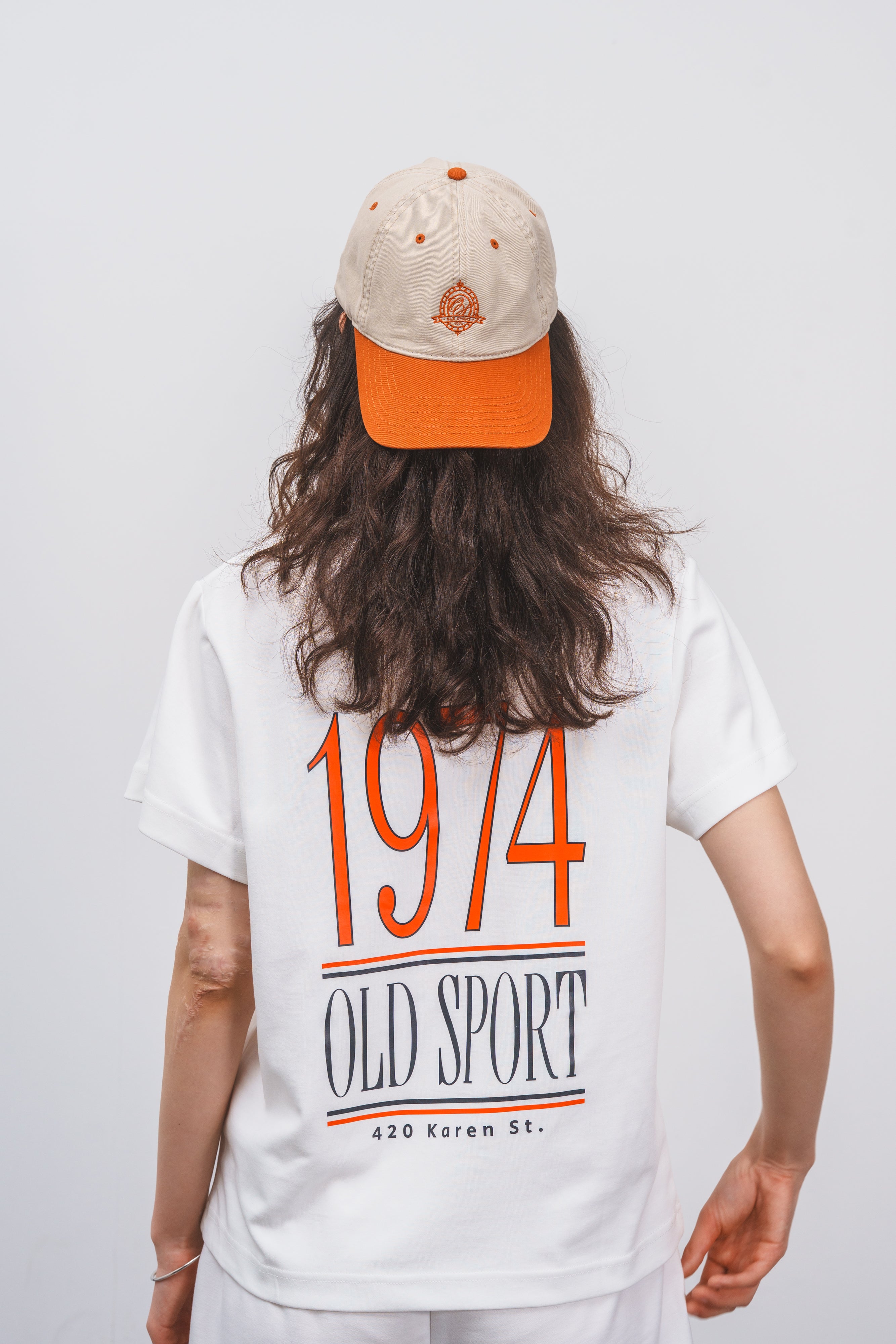 バイカラーエンブレムCAP BEIGE/ORANGE